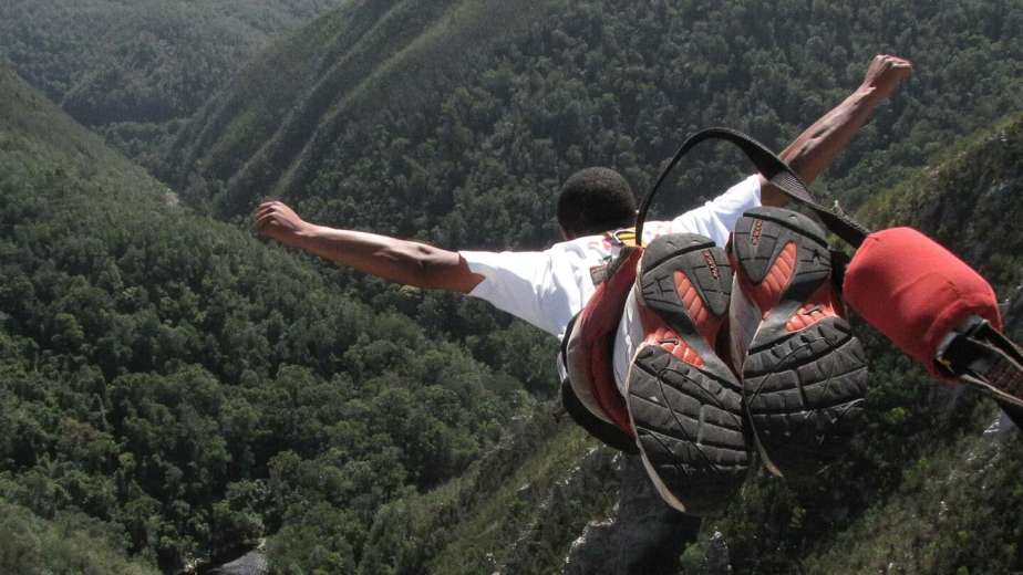 First person view of a bungy jumper falling from Bloukrans Bridge above the gorge