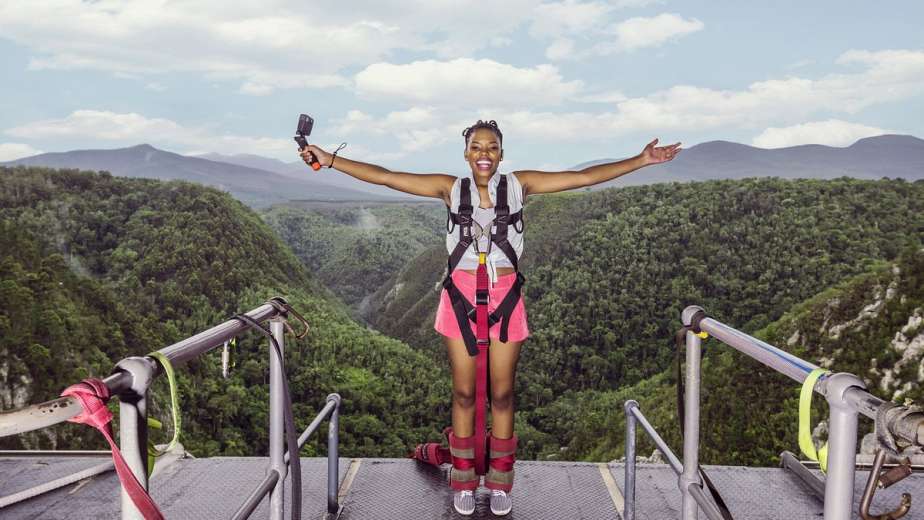 Woman standing on Bloukrans Bridge Face Adrenalin