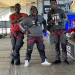 Three Face Adrenalin crew members in jump harnesses on the Bloukrans Bridge platform