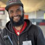 Face Adrenalin crew member holding the 360 camera used to film bungy jumps
