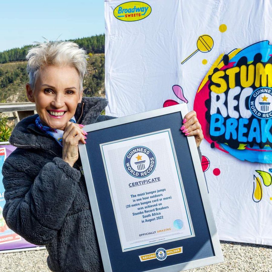 Guinness World Records certificate holder at Bloukrans Bridge with her framed record certificate